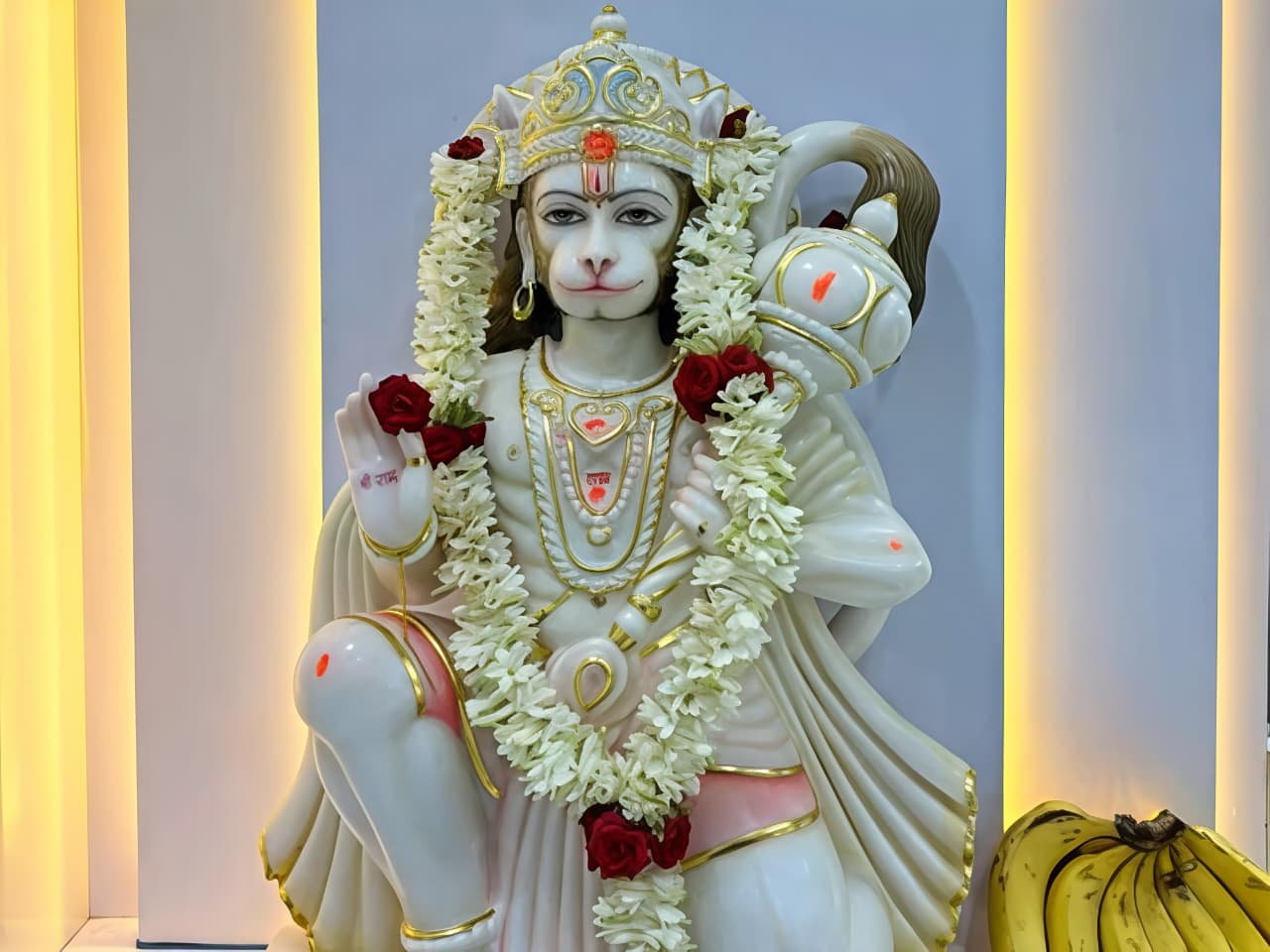 Decorated entrance of a home prepared for Griha Pravesh puja